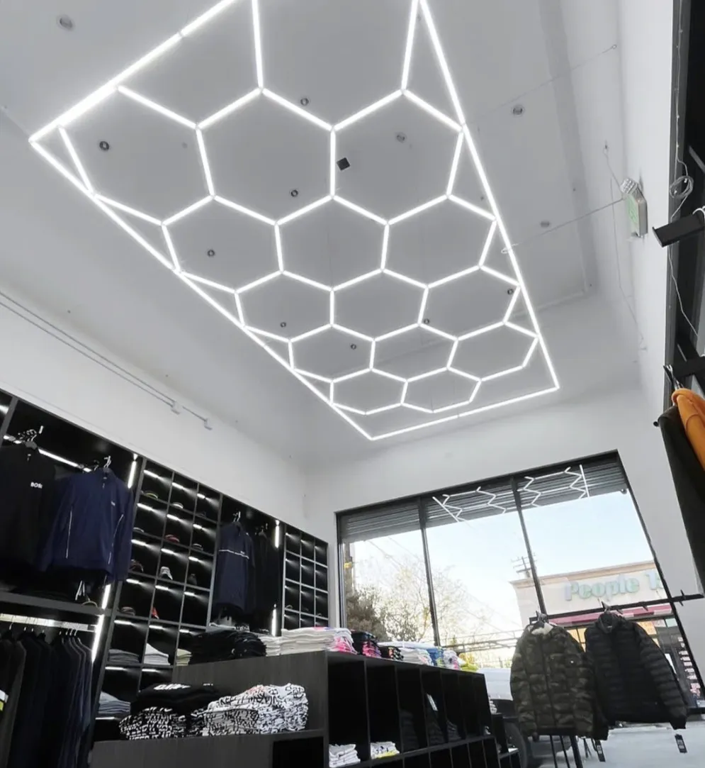 Hex grid with a lit border on a white ceiling